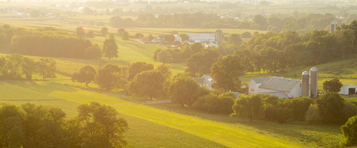 A farm in Lancaster county with the sun shining on it